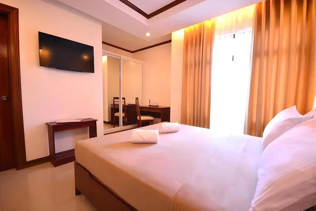 Guest room at Ipil Suites Puerto Princesa